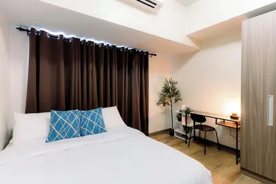 Image de Cozy 1 Br Condo in Park McKinley West, Bgc