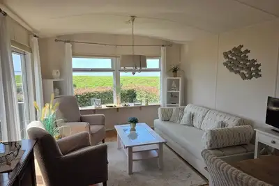 Image de Watch the sun sink into the sea from your living room at Chalet WadRust