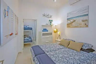 Image de Appartement central avec terrasse à 1 min de la plage, animaux admis