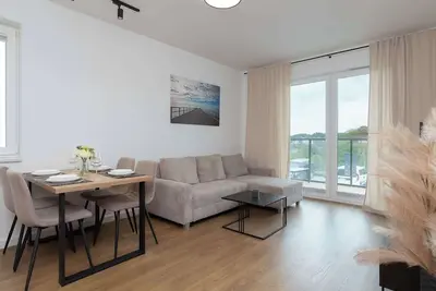 Image de Family Apartment in Gdynia with Parking and Playground by Noclegi Renters