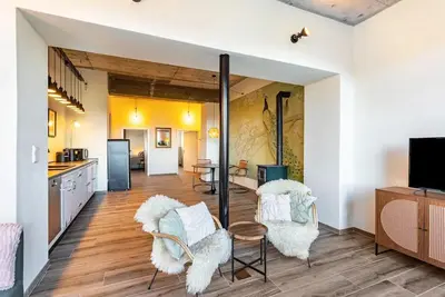 Image de Appartement « Suiten Im Alten Berghotel Antonia » avec vue sur la montagne, terrasse couverte et Wi-Fi