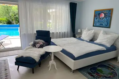 Image de Appartement 'Poolblick' avec piscine commune, terrasse privée et Wi-Fi