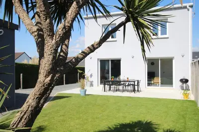 Image de Maison près de la plage avec 4 chambres et vélos offerts