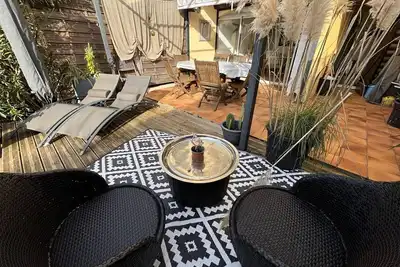 Image de Charmant appartement rénové au calme avec jardin, à 100m des commerces