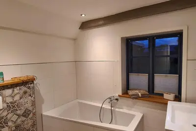 Image de Watt'n Glück - Barrier-free thatched-roof vacation home North Sea, mudflats, wind & waves