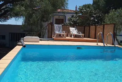 Image de Countryside 1-bedroom house in Quarteira, with WiFi & Ac