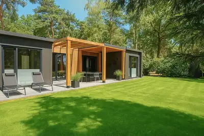 Image de Modern forest retreat with 4 bedrooms and 3 bathrooms – ideal for family holidays or group getaways in North Limburg nature.