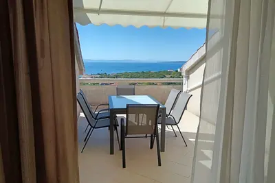 Image de Appartement de trois chambres avec la terrasse et la vue sur le mer Lun, Pag (A-24796-e)