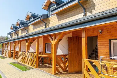 Image de Maison de vacances Międzyzdroje pour 1 - 4 personnes avec 2 chambres à coucher - Maison mitoyenne