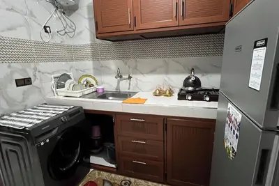 Image de Appartement à louer avec 1 chambre et 2 salons dans un quartier calme.