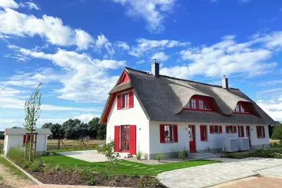 Image de Haus zwischen Mühle und Meer