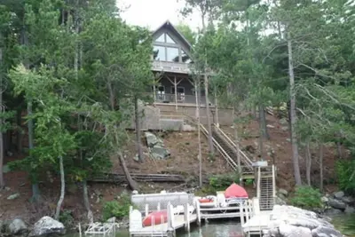 Image de Lakefront Sleepers Island - Amazing views, sunset, newer home - Boat Required