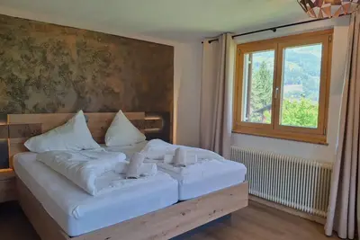Image de Alpenfeder HĂĽsli 4 person vacation apartment with terrace and garden