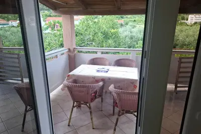 Image de Appartement de deux chambres avec la terrasse Palit, Rab (A-24800-a)