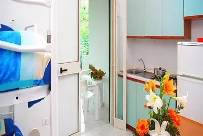 Image de Appartement 'Sabbia D'oro' avec piscine commune et Wi-Fi