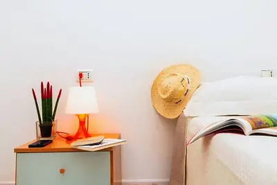 Image de Appartement 'Sabbia D'oro, Trilocale 501' avec piscine partagée et Wi-Fi