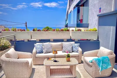 Image de Spacious new apartment 4 minutes from the beach with large panoramic terrace