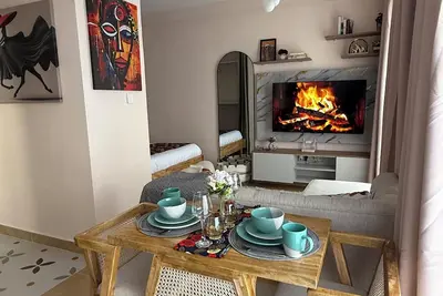 Image de Wakih homes! Cozy studio, 15 mins away from Jkia and 7 minutes away from Sgr