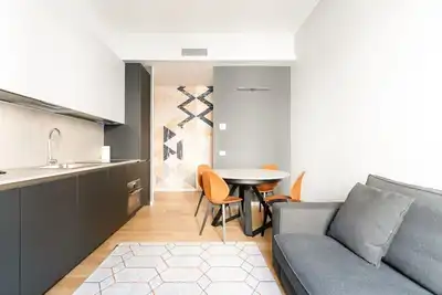 Image de Charming apartment of about 50 square meters, able to accommodate up to 4 people, located on the first floor of a building with a lift (Not suitable for disabled people - there are some steps to access it). The property is located just a few steps throw f