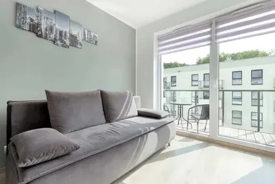Image de Nadmorskie Tarasy 15 | Gdynia | White and Grey Apartment | Parking | Desk | Balc