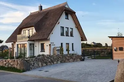 Image de Ferienhaus Strandjuwel