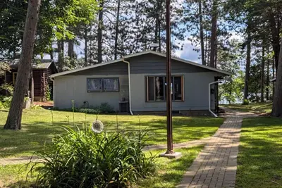 Image de Relax, golf, fish & disconnect from today's fast pace living on Sand Lake