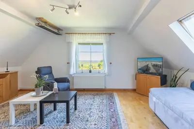 Image de The vacation apartment with a direct view of the North Sea offers space for up to four people.