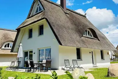 Image de Reetdach-Ferienhaus \"Anni\" mit direktem Meerblick, Sauna und Kamin