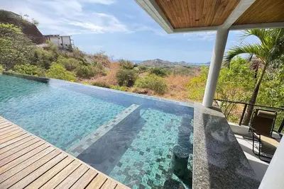 Image de Located inside the exclusive Mar Vista community, this charming casita has access to a stunning private pool with breathtaking ocean views—perfect for relaxing and enjoying unforgettable sunsets.