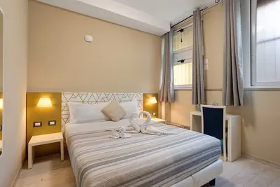 Image de Chambre quadruple avec Wi-Fi et climatisation