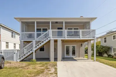 Buddy's Sandcastle, upscale beach destination with an old beachtown vibe