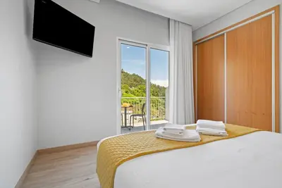 Image de Quarto Duplo Deluxe com Varanda Q3
