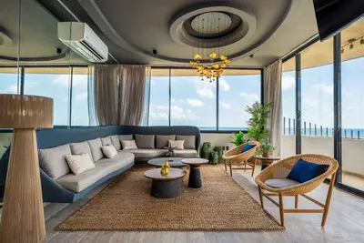 Image de Surreal coastal apartment with local design, shared pool & private jacuzzi