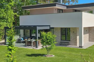 Image de Lychensee villa with lake view, conservatory, fireplace and sauna