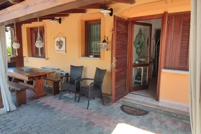Image de Maison de Vacances 'Villetta Girgolu' avec Jardin Privé et Climatisation