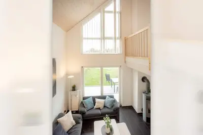 Image de Dock 61 - great vacation home for up to 4 people with wood-burning stove and sauna - pets welcome, located directly on the waterfront