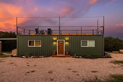 Image de Modern, pet friendly shipping container home in charming Texas Hill Country