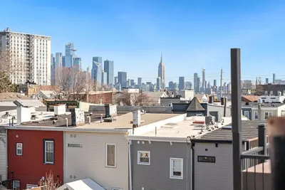 Image de 2br Condo with Private Rooftop, 15 Mins to Times Sq