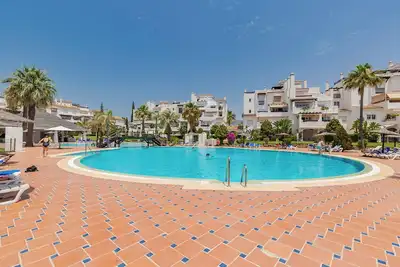 Image de Family Friendly Beachfront Las Adelfas 3 Bed-3 Bath Apt with Large Swimming pool
