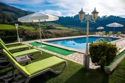 Image de Villa 'Casa Dos Leões' avec vue sur la montagne, piscine privée et Wi-Fi