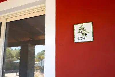 Image de Appartement 'Appartamento Ulivo Vista Piscina' avec vue sur la mer, Wi-Fi et climatisation