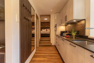 Image de Designer apartment with balcony & kitchen - 1 - Tevini Boutique Suites by we