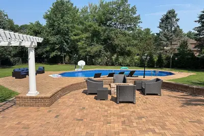 Image de Ryder Cup Awaits - Luxury 4-bedroom house w/ Pool, Ac, and gym in Saint James