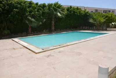 Image de Private Luxury 3-bedroom apartment in Gammarth Touristique-Pool and beach access