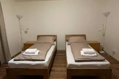 Image de Room 1 - twin room, shower/toilet on the floor - Haus St. Martin