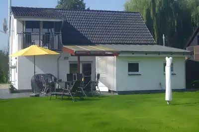 Image de Maison de vacances 'Kudensee' avec terrasse partagée, jardin privé et Wi-Fi