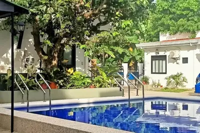 Image de Spacious apartment with separate toilet, sofa bed in living room.