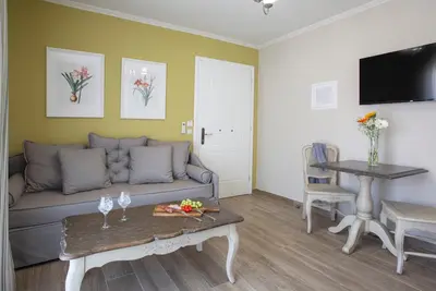 Image de Appartement 'Suite d'une chambre A' avec balcon et climatisation
