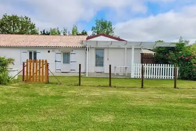 Image de Maison confortable 4 pers avec jardin fermé. Animaux acceptés!