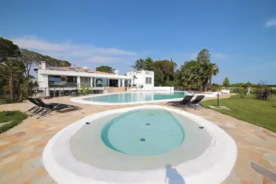 Image de Chambre Quadruple Deluxe Bed and Breakfast Loggia degli Artisti avec piscine et climatisation